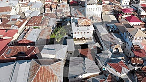 Aerial View of Stone Town, Zanzibar City, Slum Roofs and Poor Streets, Africa