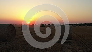 Aerial view of straw bales on farm fields