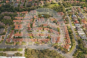 Aerial view of streets, cul-de-sacs, houses and rooftops in the suburb of Menai in Sutherland Shire, Sydney