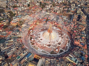Aerial view on streets of Kathmandu and a stupa of Boudnath is created in the form of a Buddhist mandala.