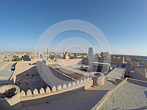 Aerial view on streets of the old city and unfinished minaret Kalta Minor. Uzbekistan. Khiva,