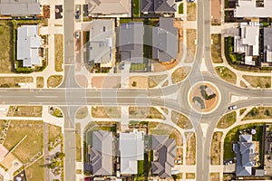 Aerial view of streets, rooftops and a roundabout
