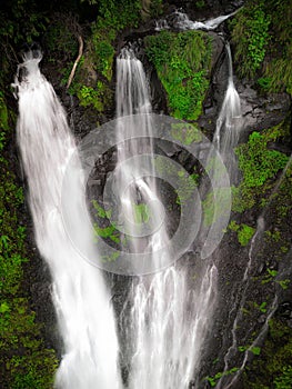A high angle aerial shot of the Pozo Azul waterfall in Costa Rica photo