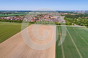 Aerial view of a suburb on the outskirts of Wolfsburg in Germany, with terraced houses, semi-detached houses and detached houses,