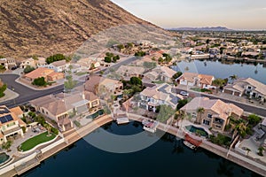 Aerial view of suburban houses near a mountain slope. Arrowhead Lakes, Glendale Arizona