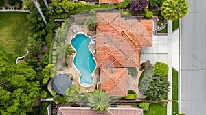 Aerial View of Suburban Luxury Home with Swimming Pool