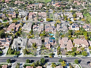 Aerial view suburban neighborhood with identical villas next to each other. San Diego, California