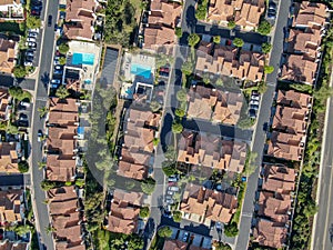 Aerial view suburban neighborhood with identical villas next to each other in the valley. San Diego, California,