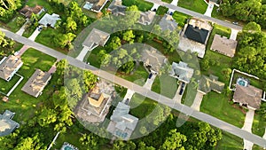 Aerial view of suburban private house wit wooden roof frame under construction in Florida quiet rural area