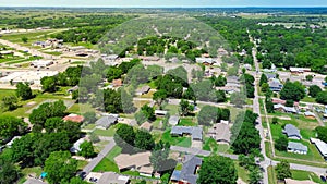 Aerial view suburbs of Checotah, McIntosh County, Oklahoma toward north of interstate I-40, east of Highway 69, suburban single- photo