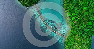 Aerial view of Sugba lagoon. Beautiful landscape with blue sea lagoon and bridge, National Park, Siargao Island, Philippines