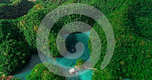 Aerial view of Sugba lagoon. Beautiful landscape with blue sea lagoon, National Park, Siargao Island, Philippines