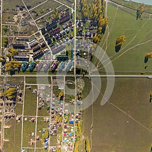 Aerial view of a summer house village at blue sea coast.