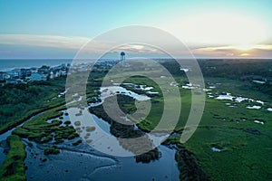 Aerial view of the sun setting at Oak Island NC