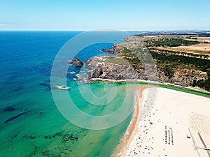 Aerial view of the sunny Odeceixe Mar Beach in Portugal