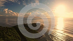 Aerial view of sunrise on Anse Royale beach on Mahe Island, Seychelles.