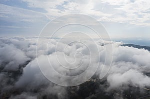 Aerial view Sunrise Beautiful sky with fog clouds. Fantastic foggy landscape glowing while sunrise in the morning. A beautiful