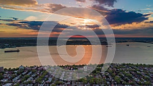 Aerial view on sunset above Brooklyn, New York City. Timelapse dronelapse.