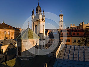 aerial view of sunset above old european city. church bell tower