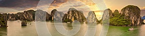 Aerial view of sunset and dawn near rock island, Halong Bay, Vietnam, Southeast Asia. UNESCO World Heritage Site. Junk boat cruise
