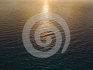Aerial view of a sunset over the sea