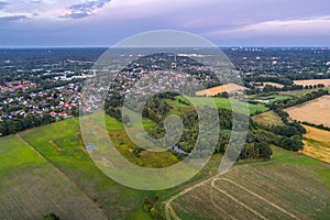 Aerial view of sunset over the summer park.