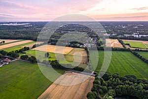 Aerial view of sunset over the summer park.