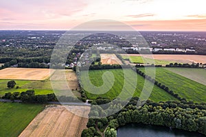 Aerial view of sunset over the summer park.