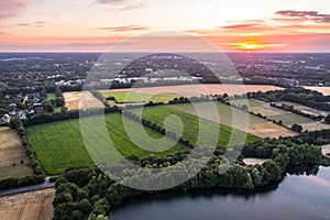 Aerial view of sunset over the summer park.