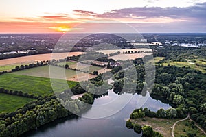 Aerial view of sunset over the summer park.