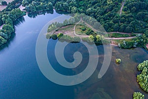 Aerial view of sunset over the summer park.