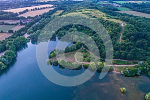 Aerial view of sunset over the summer park.