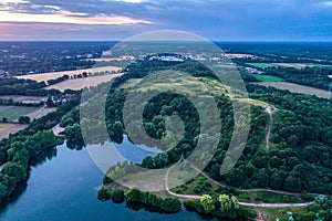 Aerial view of sunset over the summer park.