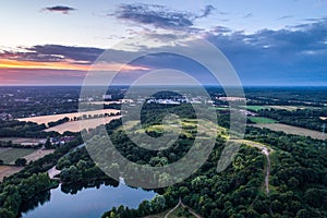 Aerial view of sunset over the summer park.