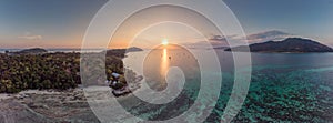 Aerial view of sunset over tropical sea with lipe paradise island