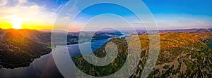 Aerial view of sunset over Ullswater lake in Lake District, a region and national park in Cumbria in northwest England