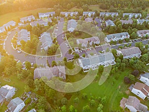 Aerial view at sunset the roofs of houses in the small town of America at sunset