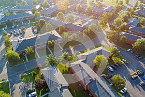 Aerial view at sunset the roofs of houses in the small town of America at sunset