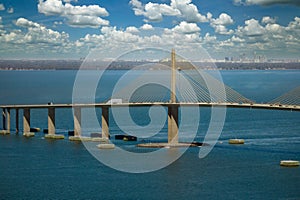 Aerial view of Sunshine Skyway Bridge over Tampa Bay in Florida with moving traffic. Concept of transportation