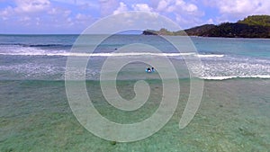 Aerial View Of Surfers, Baie Lazare Beach, Mahe Island, Seychelles 4