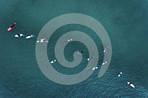 Aerial view of surfers in the ocean at the Baleal beach in Peniche