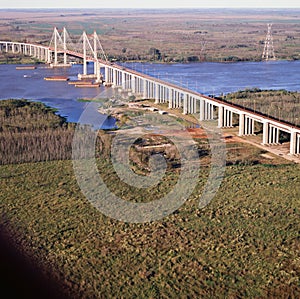 aerial view of the suspension bridge of zarate brazo largo crossing the parana river province of buenos aires argentina, photo