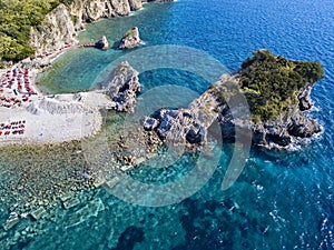 Aerial view of Sveti Nikola, Budva island, Montenegro. Jagged coasts with sheer cliffs overlooking the transparent sea
