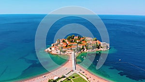 Aerial view of Sveti Stefan, island in Montenegro surrounded by Adriatic coast