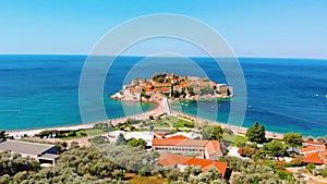 Aerial view of Sveti Stefan, island in Montenegro surrounded by Adriatic coast