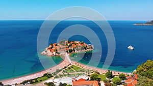 Aerial view of Sveti Stefan, island in Montenegro surrounded by Adriatic coast