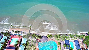 Aerial view of Swimming pool and the beach in the resort