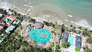 Aerial view of Swimming pool and the beach in the resort