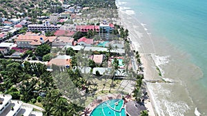 Aerial view of Swimming pool and the beach in the resort