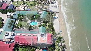 Aerial view of Swimming pool and the beach in the resort